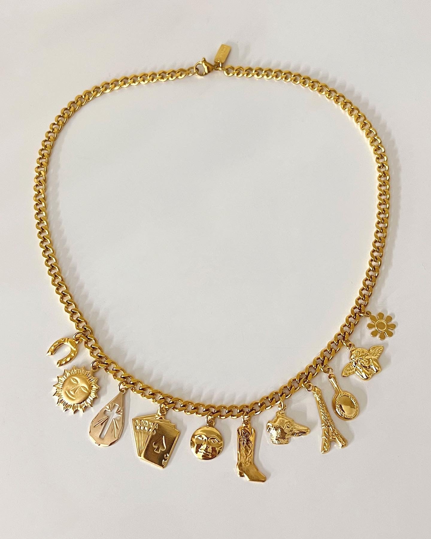 Multi-charm gold necklace
