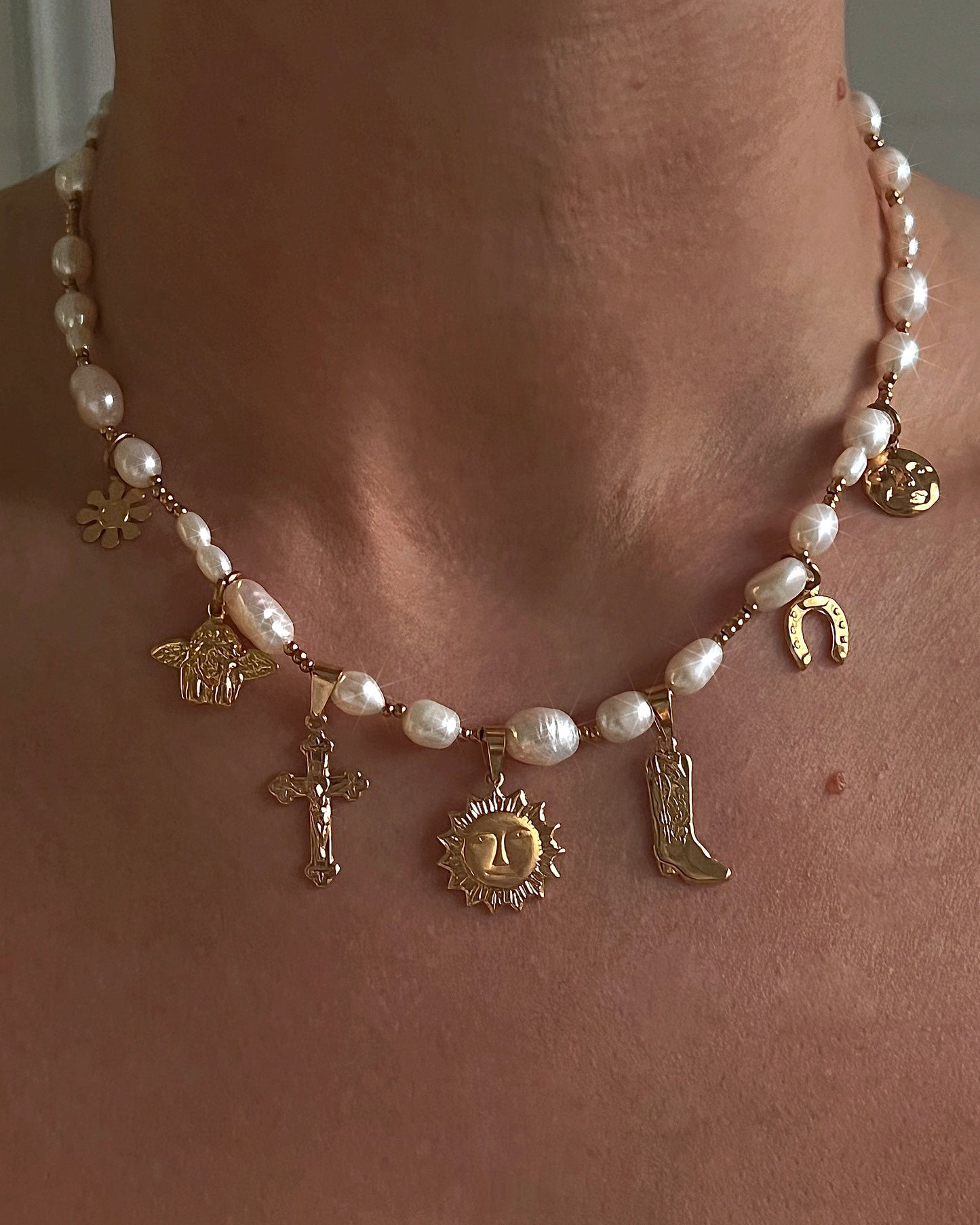 Multi-charm Pearl necklace 1